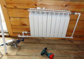 Установка батарей отопления в деревянных домах